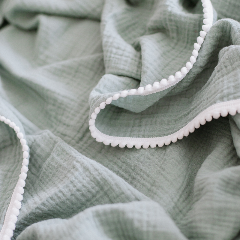 Sage Pom Pom Swaddle Blanket