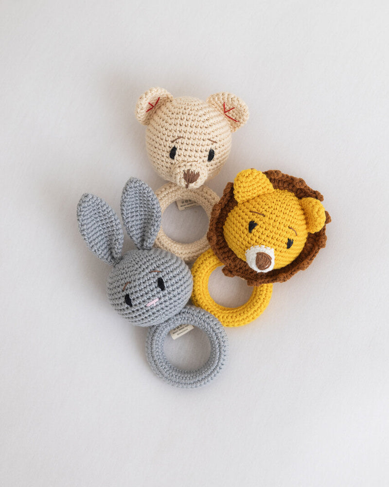 Barney and Bella crochet baby rattles featuring Barney Bear, Louie Lion and Bella Bunny