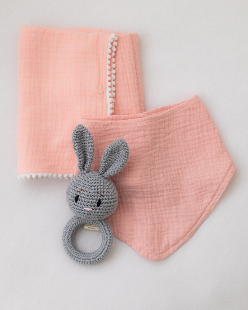 Barney and bella organic cotton pink muslin and bib baby gift set with Bella Bunny crochet rattle.

